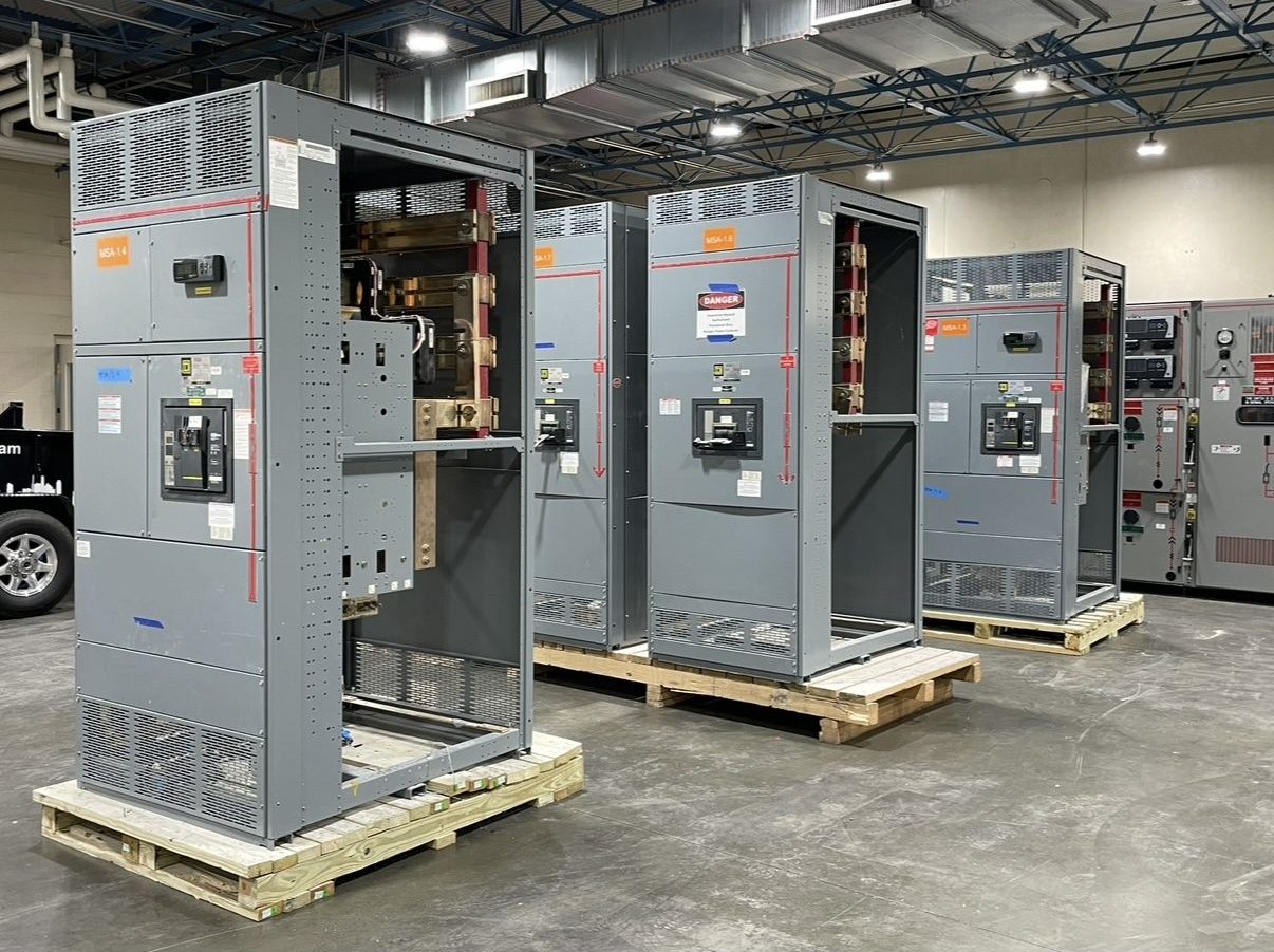 Switchgear frames and bus sections in our warehouse after a surplus buyout