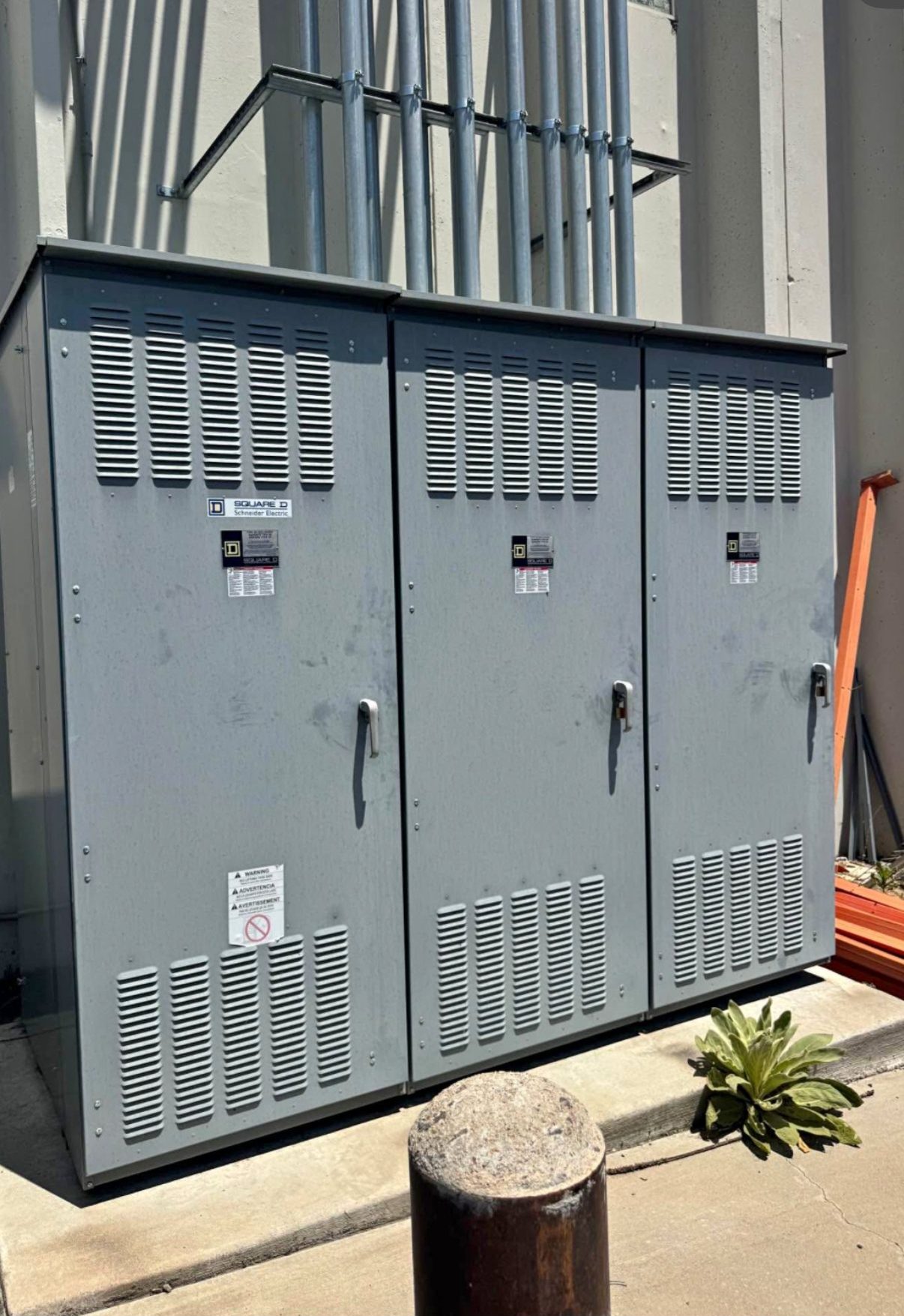 Three Square D padmount transformer cabinets purchased on-site before pickup